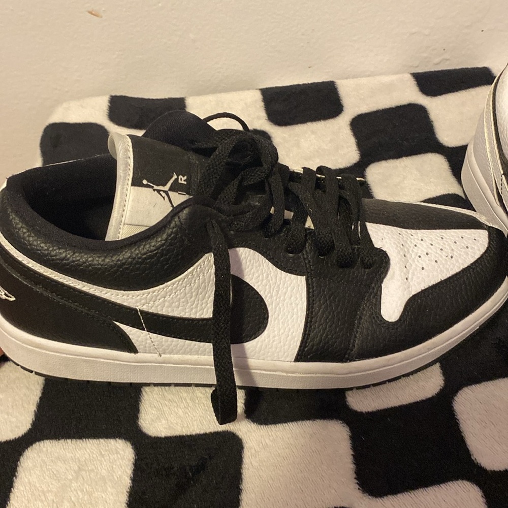 Black and white checkered Air Jordan 1s